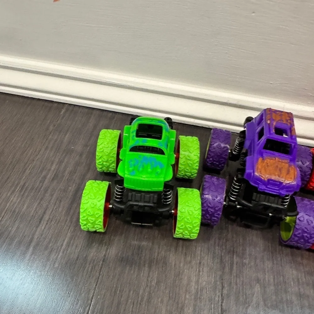 NWOT Monster Truck Toy Set - Green, Purple, Red, and Orange Kids Boys- 4 Cars